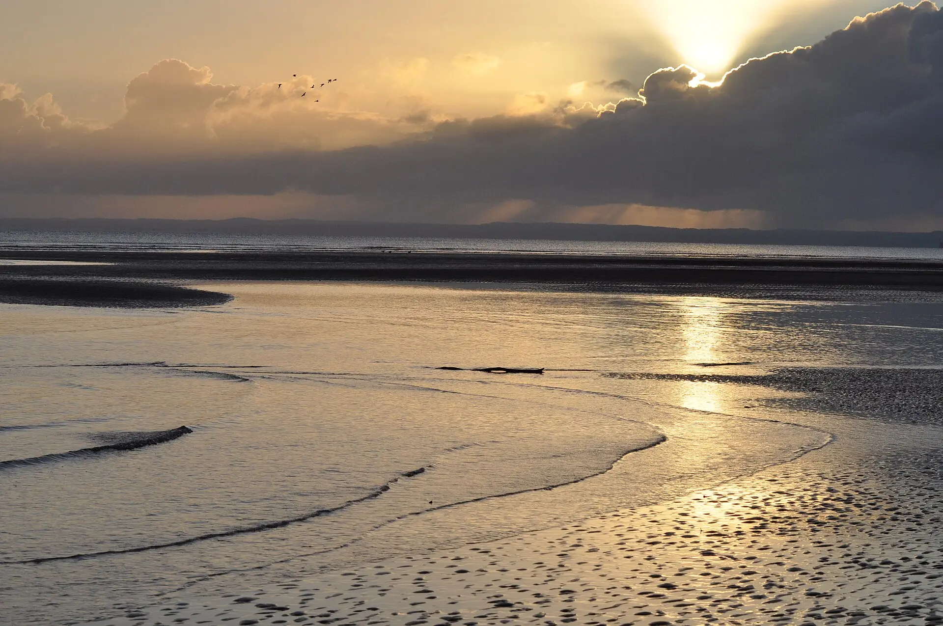 Warm sunrise light over the water at Hervey Bay
