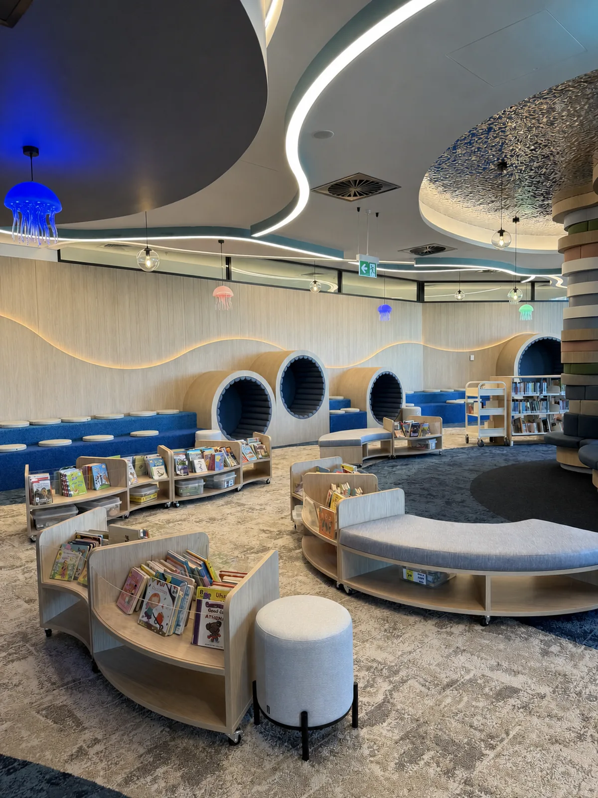 Curved shelves, reading spaces and play features in the new Hervey Bay children’s library